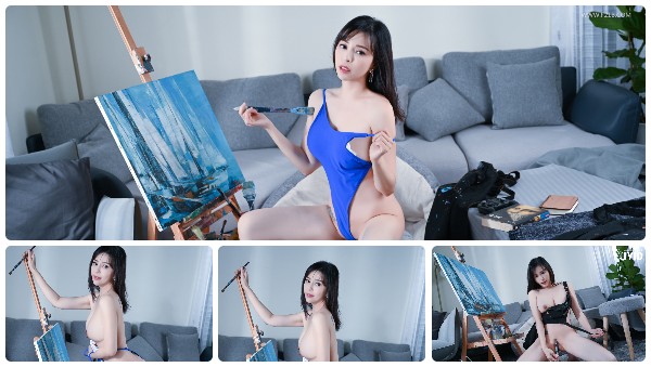 手持畫筆的美女